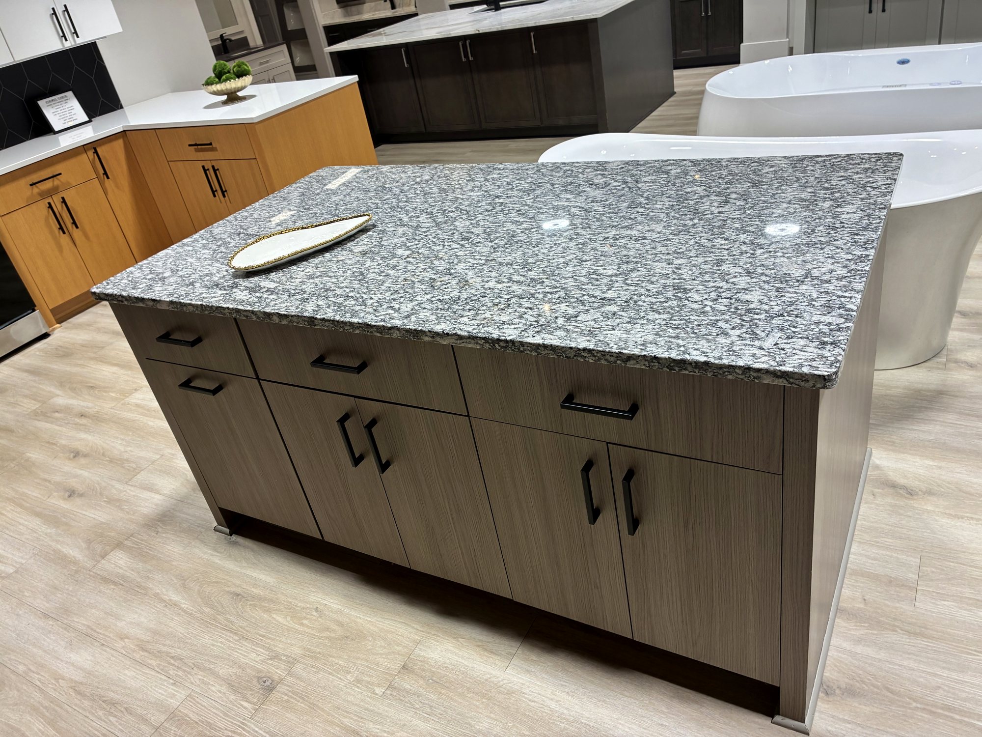Granite island with cabinetry