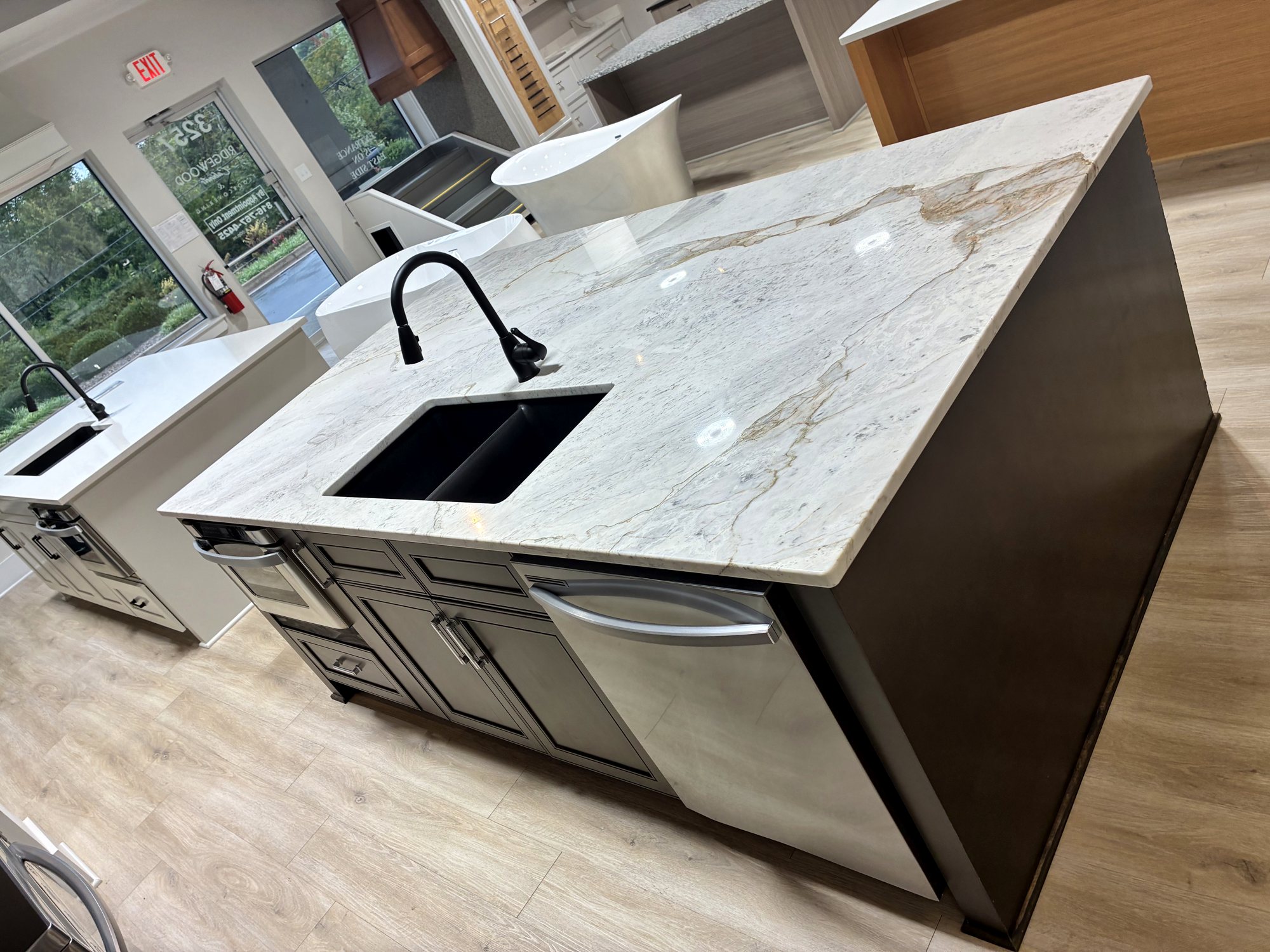 Island with waterfall stone countertop