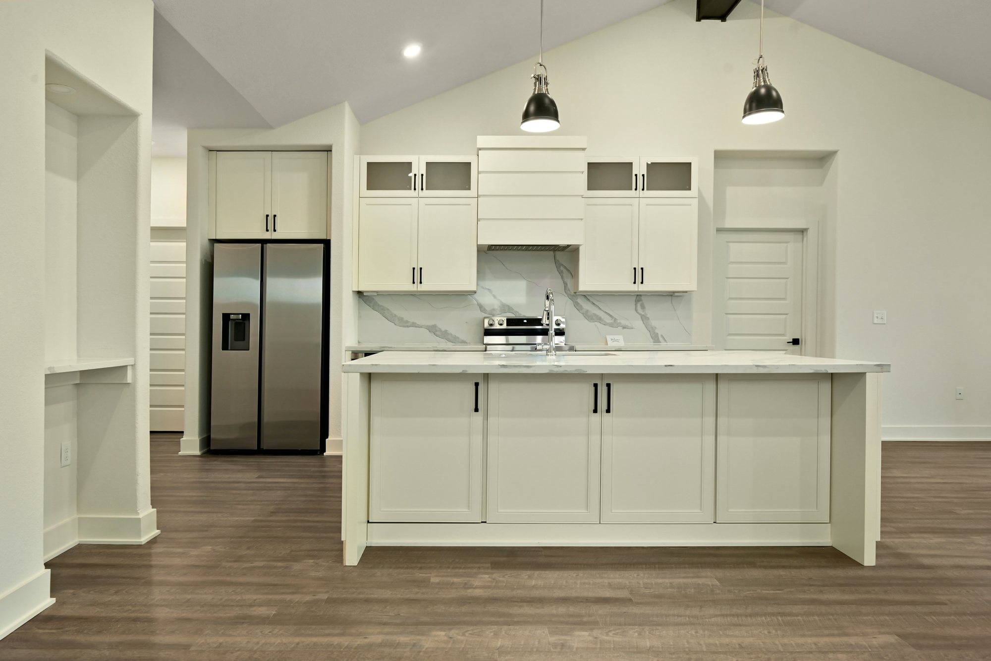Oak Ridge Farms — white cabinetry with waterfall island