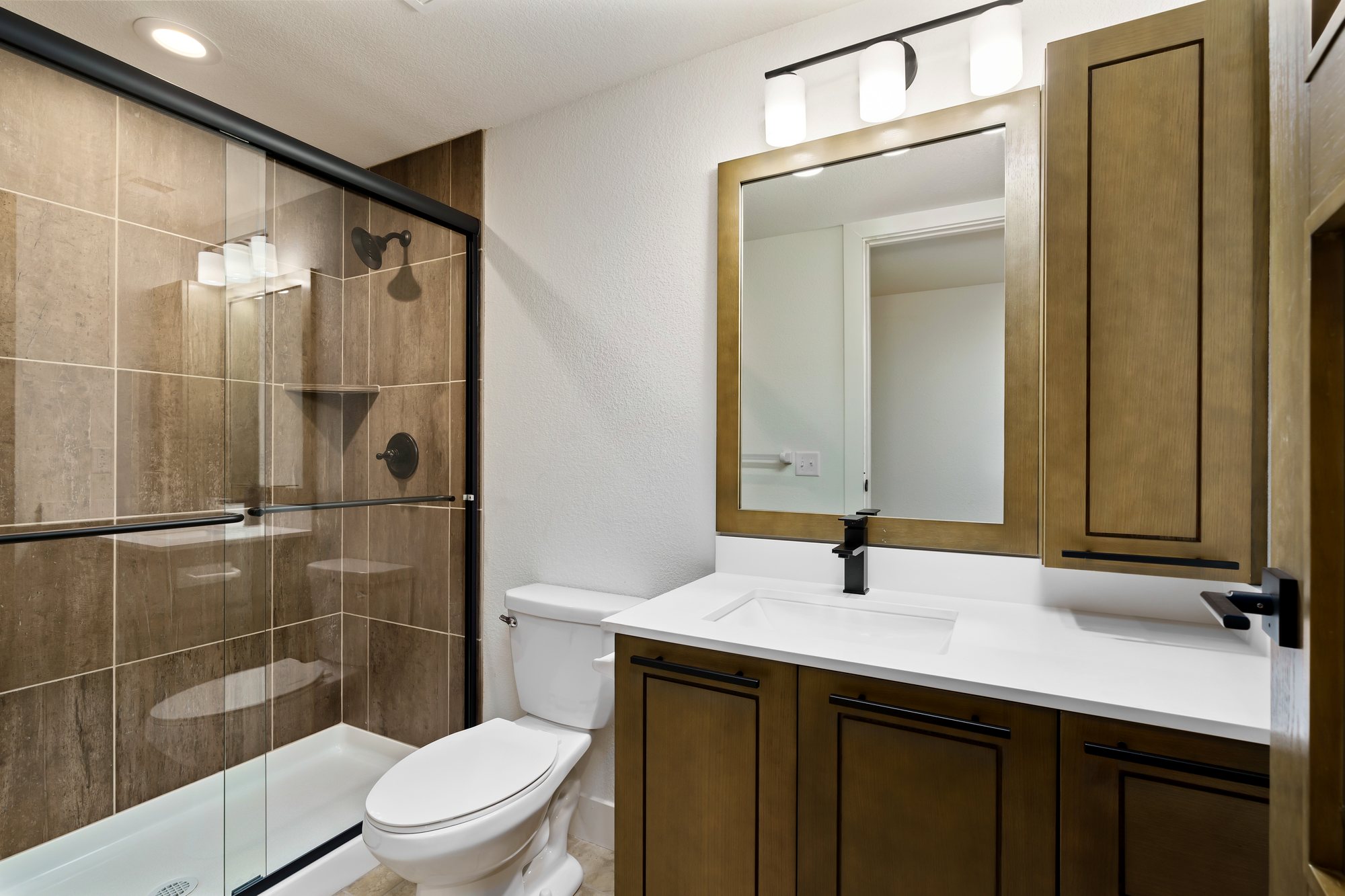 Oak Ridge Farms — tiled shower with vanity